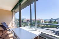 an office with a desk and a large window at Cosy Apt Of 25 M Near The City View On Sea in La Seyne-sur-Mer