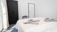 Posteľ alebo postele v izbe v ubytovaní Apartman A2 s vlastitim bazenom
