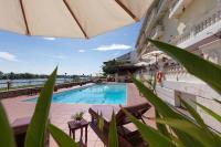 a view of the pool at a hotel with plants at Victoria Chau Doc Hotel in Chau Doc