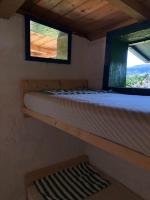 A bed or beds in a room at Vistalago Garden Doria