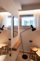 Televízia a/alebo spoločenská miestnosť v ubytovaní SII City Luxury Suites