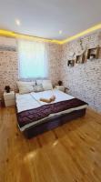 Posteľ alebo postele v izbe v ubytovaní Siófok Private House