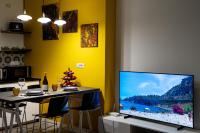 TV a/nebo společenská místnost v ubytování Domus Enea