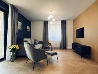 TV a/nebo společenská místnost v ubytování Apartamenty Maxa Czornyja