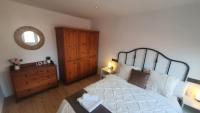 Postel nebo postele na pokoji v ubytování Las Terrazas de Güeli 6 pax WiFi - GARAJE - Vistas - VUT-3391-AS