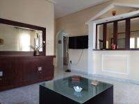 TV a/nebo společenská místnost v ubytování Platanidia Apartment Pelion