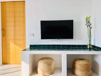 A television and/or entertainment centre at CocoBeach Mojácar
