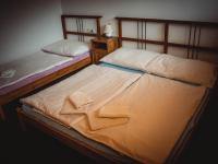 Postel nebo postele na pokoji v ubytování Penzion u Hajneho Bedricha