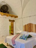 A bed or beds in a room at Il Nachiro