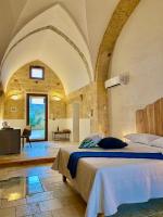 A bed or beds in a room at Il Nachiro
