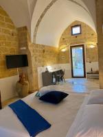 A bed or beds in a room at Il Nachiro