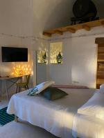 A bed or beds in a room at Il Nachiro
