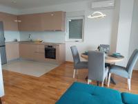 Kuchyňa alebo kuchynka v ubytovaní Sunrise apartment