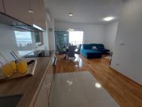 Kuchyňa alebo kuchynka v ubytovaní Sunrise apartment
