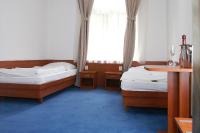 Postel nebo postele na pokoji v ubytování Penzion Hacienda Ranchero