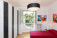 Posteľ alebo postele v izbe v ubytovaní Ponte Milvio-Rental in Rome