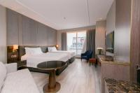 Ein Bett oder Betten in einem Zimmer der Unterkunft Centara Grand At CentralWorld