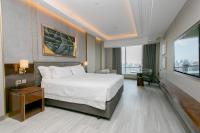 Ein Bett oder Betten in einem Zimmer der Unterkunft Centara Grand At CentralWorld