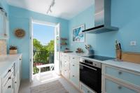 A kitchen or kitchenette at Korakiana Cottage