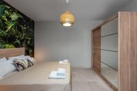 Posteľ alebo postele v izbe v ubytovaní Port Living Apartments