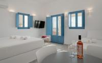 Postel nebo postele na pokoji v ubytování Camvillia Donoussa Village Suites