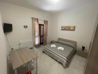 Posteľ alebo postele v izbe v ubytovaní B&B Il Dolce Nido