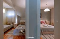 Posteľ alebo postele v izbe v ubytovaní HELIANTHOS VILLA - APARTMENT No1