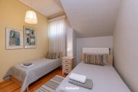 Posteľ alebo postele v izbe v ubytovaní HELIANTHOS VILLA - APARTMENT No1