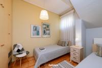 Posteľ alebo postele v izbe v ubytovaní HELIANTHOS VILLA - APARTMENT No1