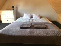 Posteľ alebo postele v izbe v ubytovaní Domek letniskowy Sunny House , Nocleg Zator Energylandia