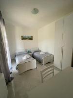 Posteľ alebo postele v izbe v ubytovaní B&B Il Dolce Nido
