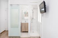 Koupelna v ubytování Marmoles 21, City Center Apartment