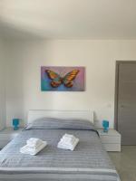 Posteľ alebo postele v izbe v ubytovaní B&B Il Dolce Nido