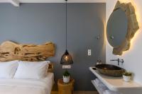 Posteľ alebo postele v izbe v ubytovaní Casa Anna Suites
