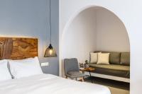 Posteľ alebo postele v izbe v ubytovaní Casa Anna Suites