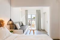 Posteľ alebo postele v izbe v ubytovaní Casa Anna Suites