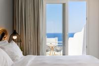 Posteľ alebo postele v izbe v ubytovaní Casa Anna Suites