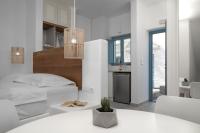 Postel nebo postele na pokoji v ubytování Camvillia Donoussa Village Suites