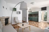 Televízia a/alebo spoločenská miestnosť v ubytovaní Holiday House Podraduc