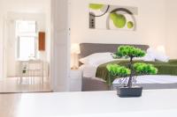 Posteľ alebo postele v izbe v ubytovaní Pleasing 2BR Apt. AKH-Perfect for Groups
