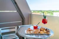 Nápoje v ubytovaní Hotel Alexander