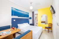 Posteľ alebo postele v izbe v ubytovaní Hotel Alexander