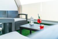Nápoje v ubytovaní Hotel Alexander