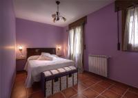 A bed or beds in a room at Paloma