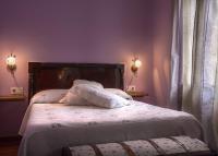 A bed or beds in a room at Paloma