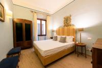 Posteľ alebo postele v izbe v ubytovaní Apartments Florence- Palazzo Pitti
