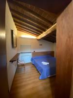 Posteľ alebo postele v izbe v ubytovaní Agriturismo La Sorgente di Rossi Valentino