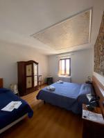 Posteľ alebo postele v izbe v ubytovaní Agriturismo La Sorgente di Rossi Valentino