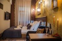 Postel nebo postele na pokoji v ubytování Ars Cracovia Apartments