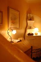 a lamp sitting on a desk in a room at Mas de la Beaume in Gordes